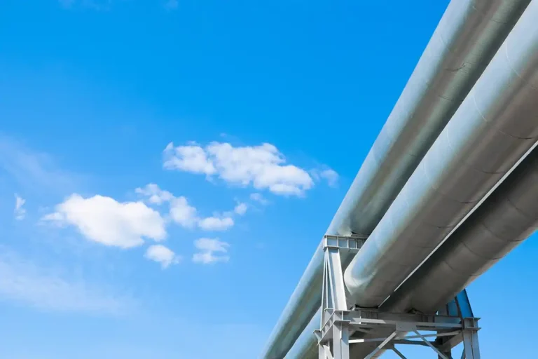 CO2 Transport and Storage Availability, A pipeline against a blue sky with clouds